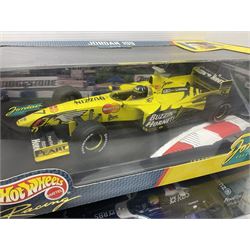 Five Mattel Hot Wheels 1:18 scale die-cast racing cars - Ferrari 248F1 Michael Schumacher, Renault F1 Team R25 Fernando Alonso, Williams F1 Team Williams FW28 Mark Webber, Jordan 199 Damon Hill and Williams F1 Team BMW; all boxed (5)