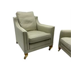 Three-piece hardwood-framed lounge suite - large two-seat Knole sofa with drop ends, upholstered in patterned fabric decorated with urns and foliage (W190cm, D117cm, H88cm); armchair upholstered in contrasting geometric pattern fabric (W83cm, D102cm, H93cm); and another armchair (W82cm, D102cm, H92cm) (3)