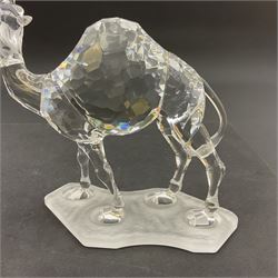 Swarovski Crystal animals, comprising camel and lion, both upon frosted crystal bases, together with Swarovski Crystal palm tree, upon similar frosted crystal base, tallest H14cm