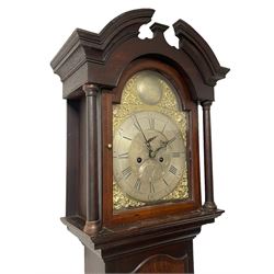 Thomas Hutchinson of Leeds - 18th century 8-day oak longcase clock with as broken arched  pediment and moulded cornice, with a conforming hood door flanked by plain turned pilasters with gesso capitals,  long trunk door with a wavy top on a square plinth with a raised panel, brass dial with cast spandrels,  engraved silvered dial centre and chapter ring with Roman numerals, five minute Arabic's and minute track, with pierced steel hands, seconds pointer,  arched calendar aperture and silvered boss engraved with the makers name to the break arch, dial pinned to a rack striking two train movement with a recoil anchor escapement. With weights and pendulum. Thomas Hutchinson is recorded as working in Leeds from 1760-90.