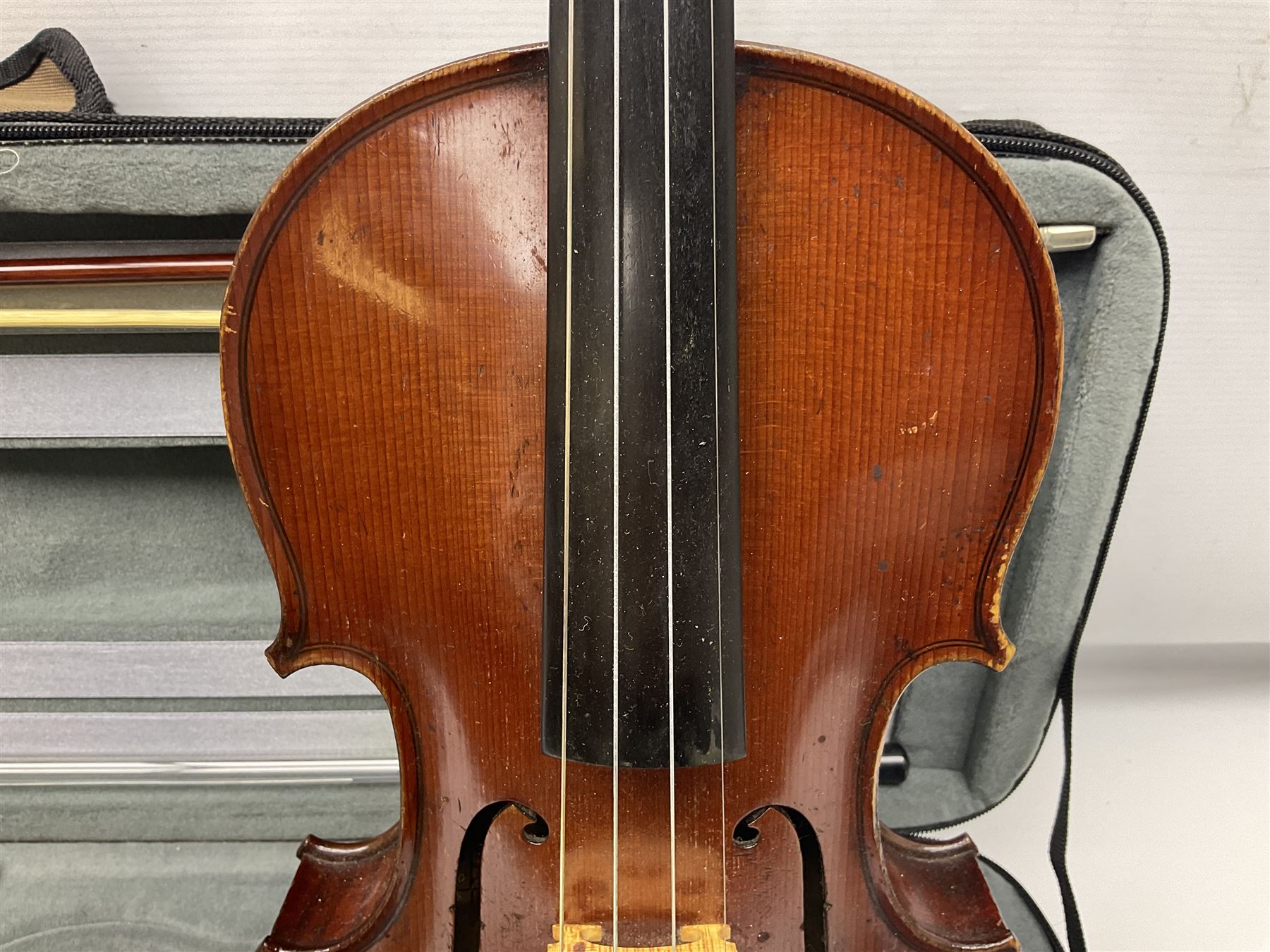 Early 20th century French Mirecourt violin with 35.5cm two-piece maple back and ribs and spruce top; bears label 'The Garrodus Violin H & Co No.1587 Anno 1912' L59cm overall; in modern fitted case with bow