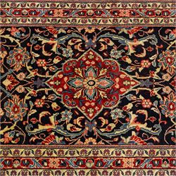 North West Persian Hamadan hand-knotted runner, deep navy field with central stylized medallion with pendants, surrounded by angular floral motifs, within an ivory border of repeating rosettes and stylized leaves, enclosed by guard stripes, fringe ends 