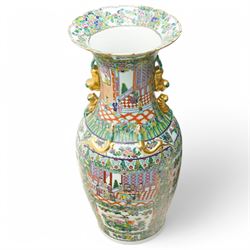 Pair of large 20th century Chinese famille rose floor vases, each of baluster form with waisted neck with gilt foo dog mounted shoulders, and lobed flared rim, decorated with alternating reserves of figures and birds and butterflies amidst blossoming flowers, the white ground profusely detailed with flower heads, each with character mark beneath, H87cm 