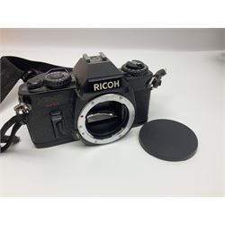 Four camera bodies, to include, Ricoh KR-10 serial no. 38826, Pentax MZ-M serial no. 4185969 with 'SMC Pentax- M 1:3.5 28mm' lens, Canon EOS500 serial no. 080927, with 'Sigma Zoom 100-300mm 1:4.5-6.7 DL'  lens etc, with other camera lenses and equipment 