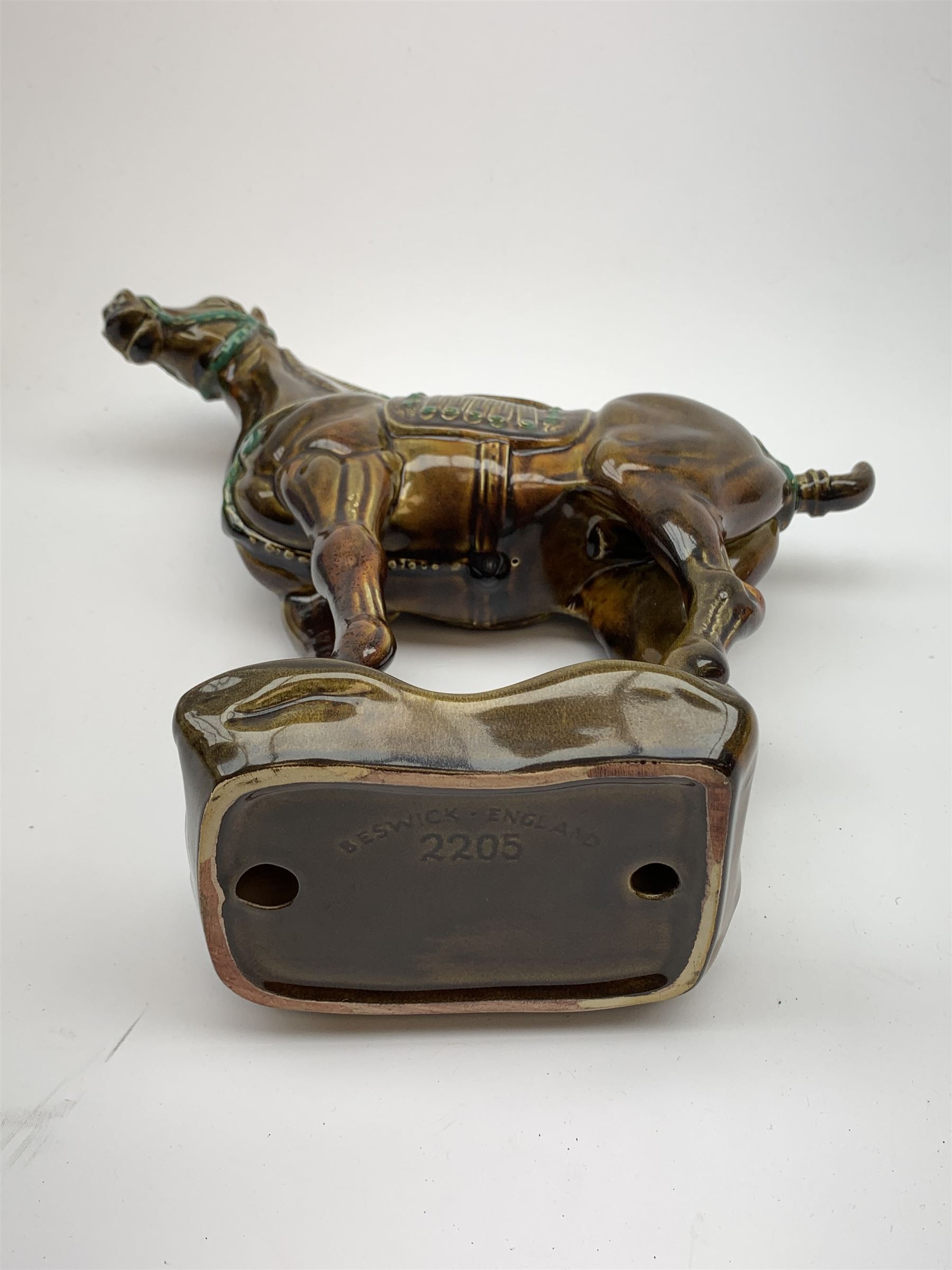 A large Beswick figure modelled as a Tang horse, with impressed marks beneath, H34cm