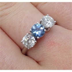  18ct white gold round aquamarine and round brilliant cut diamond three stone ring, hallmarked, aquamarine approx 0.5 carat, diamond total weight 1.00 carat  