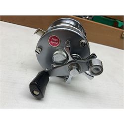 Four Abu fishing reels, comprising Ambassadeur 9000, Ambassadeur 7000, Ambassadeur 5500 and Ambassadeur 6500, together with additional line, hardy fishing bag and two wooden boxes