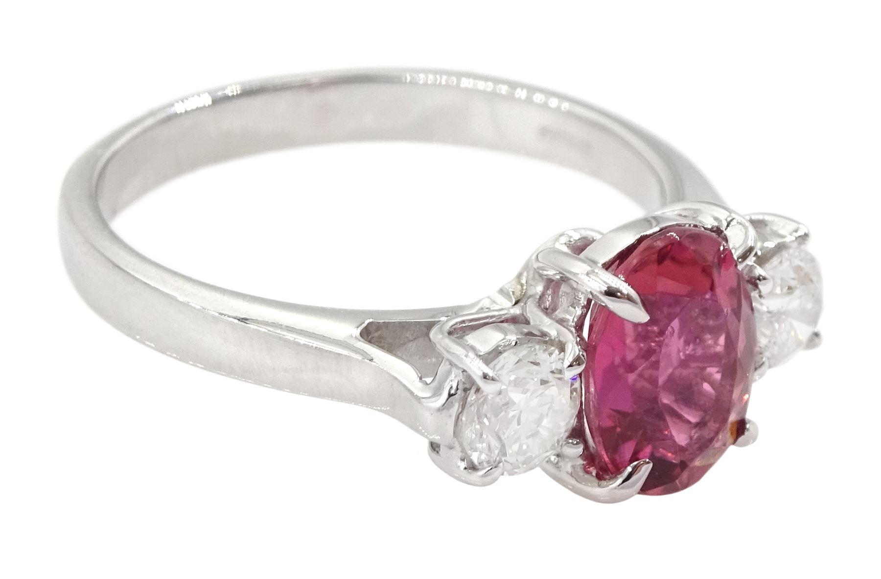 18ct white gold three stone oval cut pink tourmaline and round brilliant cut diamond ring, hallmarked, tourmaline approx 2.60 carat, total diamond weight approx 0.40 carat