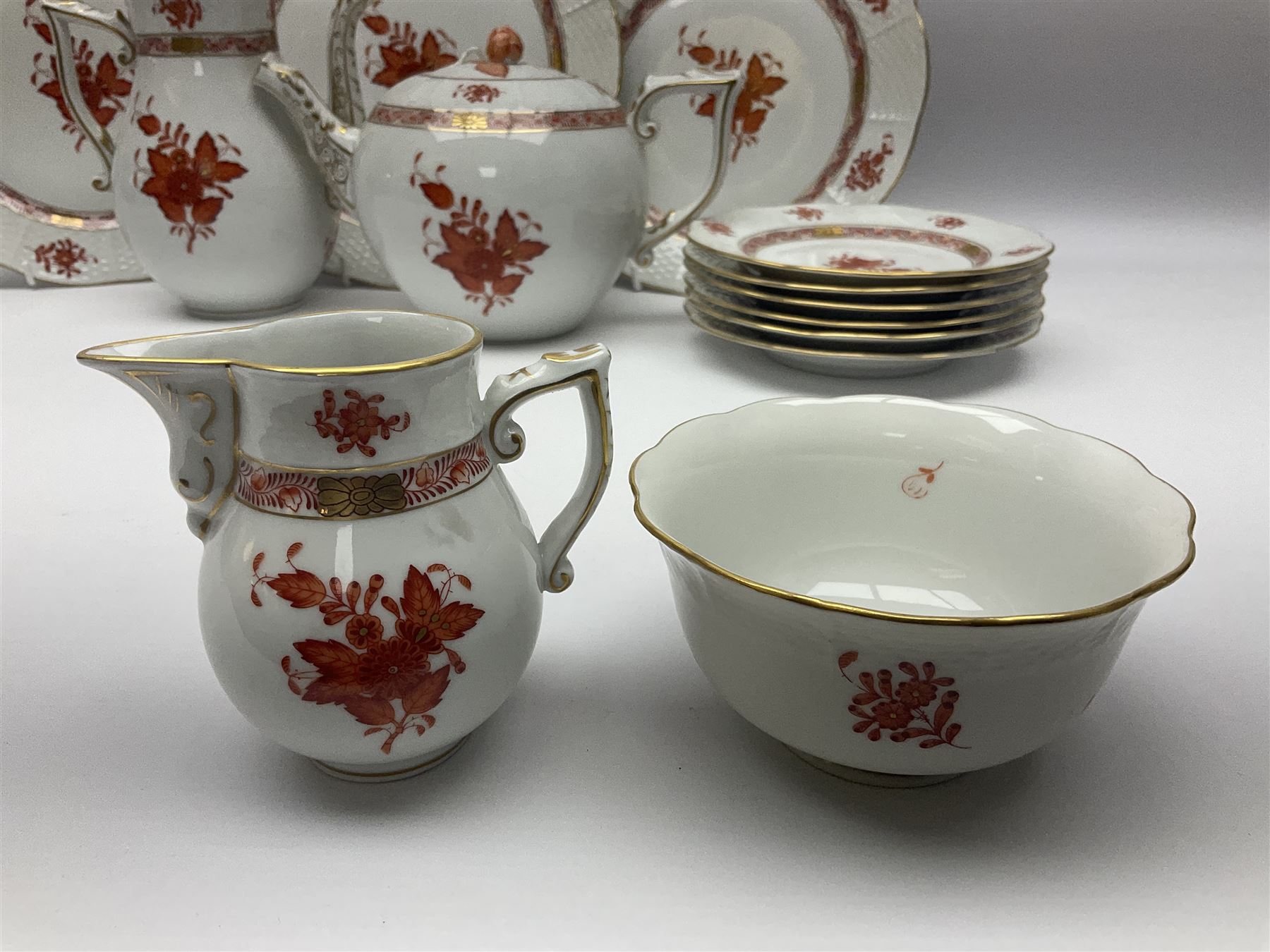 Herend Chinese Bouquet Rose pattern tea service comprising teapot, coffee pot, open sucrier, six cups and saucers, six tea plates, cream jug and stand, milk jug, two teabag holders, preserve pot, two leaf shaped dishes, four egg cups, salt & pepper pots, pair side plates and another plate