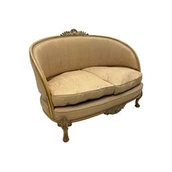 French Louis XV design walnut framed sofa, tub-shaped upholstered back with gilt foliate carved crest, padded seat with twin loose cushions, raised on cabriole supports with shell and acanthus leaf carvings