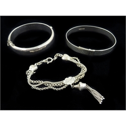 Silver hinged bangle Chester 1954, silver bangle Birmingham 1975 and a silver watch chain bracelet