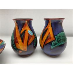 Four pieces of Poole Pottery in Graffiti pattern, comprising pair of vases of baluster form, dish and small plate, with impressed or printed marks beneath, vase H17cm