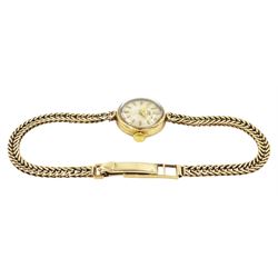 Tudor Royal ladies 9ct gold manual wind wristwatch, silvered dial with dagger and baton hour markers, on integral 9ct gold bracelet, Birmingham 1963