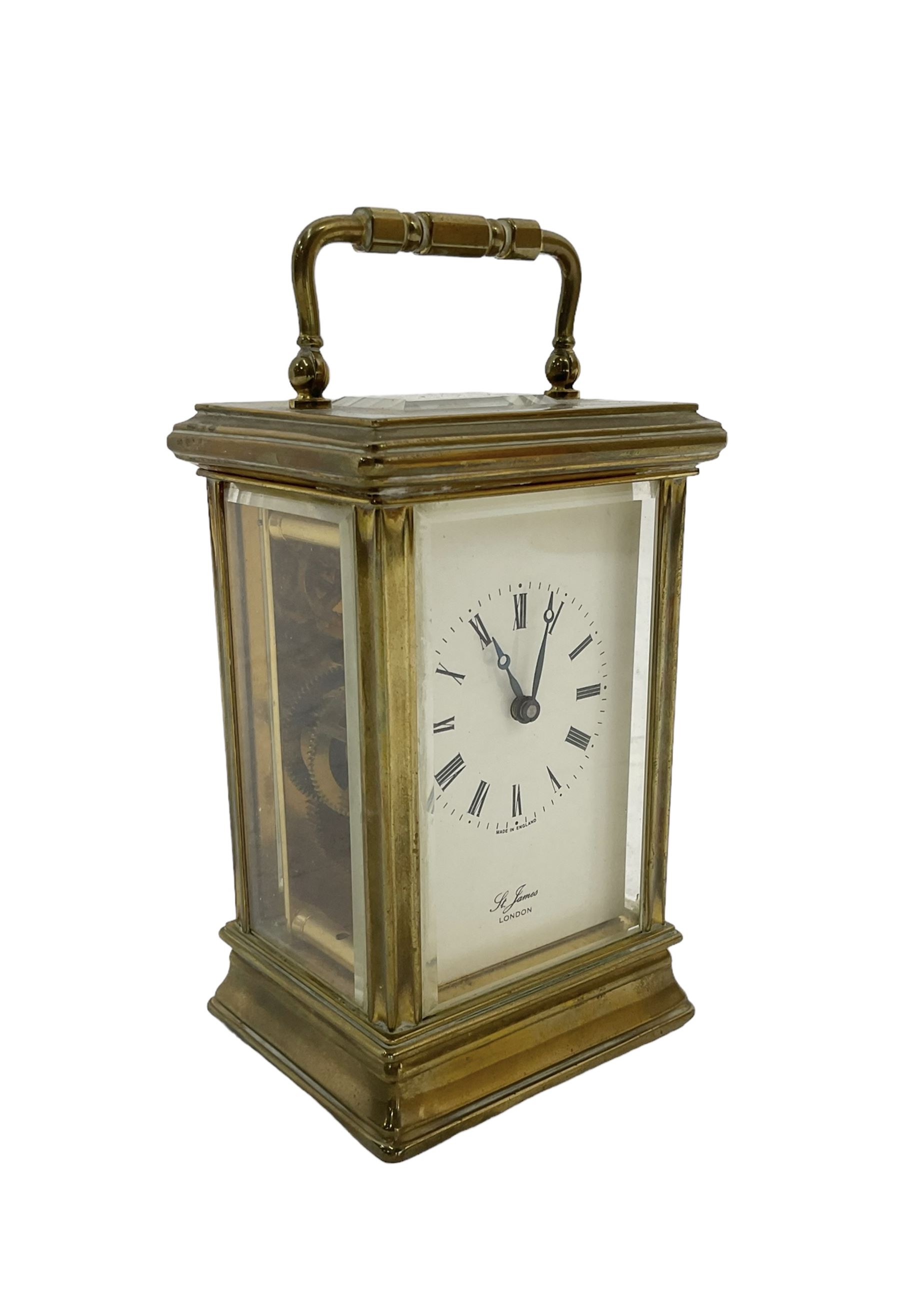 English - 20th century 8-day carriage clock, dial inscribed St James, London, dial with Roman numerals, minute markers and moon hands, lever platform escapement with eleven jewels. With key. 