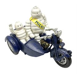 Cast iron figure of Michelin Man on motorbike modelled with smaller seated Michelin man in sidecar, H16cm