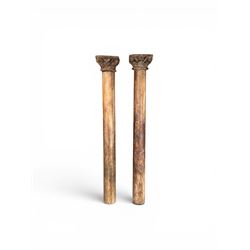 Matched pair of 19th century hardwood architectural columns with carved capitols, column diameter 18cm