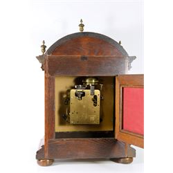 Edwardian 8-day oak cased striking mantle clock striking the hours and half hours on twin bells, with a German 20th century Hermle movement and floating balance escapement (2 jewels),  square brass dial with a silvered 4