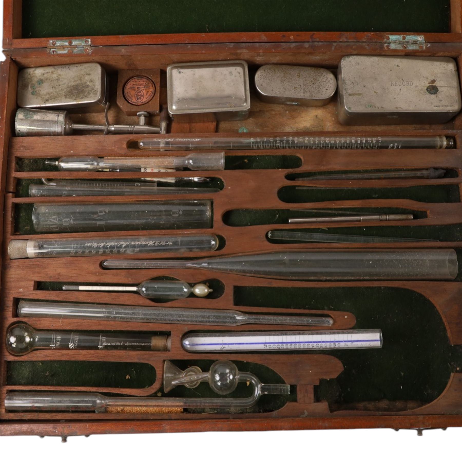 Medical instruments, including glass thermometers, unicometer, sulfatometer, ammonia meter, acidimeter for urine, albumenometer, sacchanometer, syringes etc, contained within wooden box