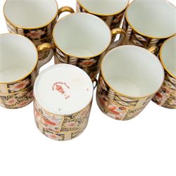 Royal Crown Derby Imari 2451 pattern, part tea service comprising eight coffee cans and saucers and seven cake plates 