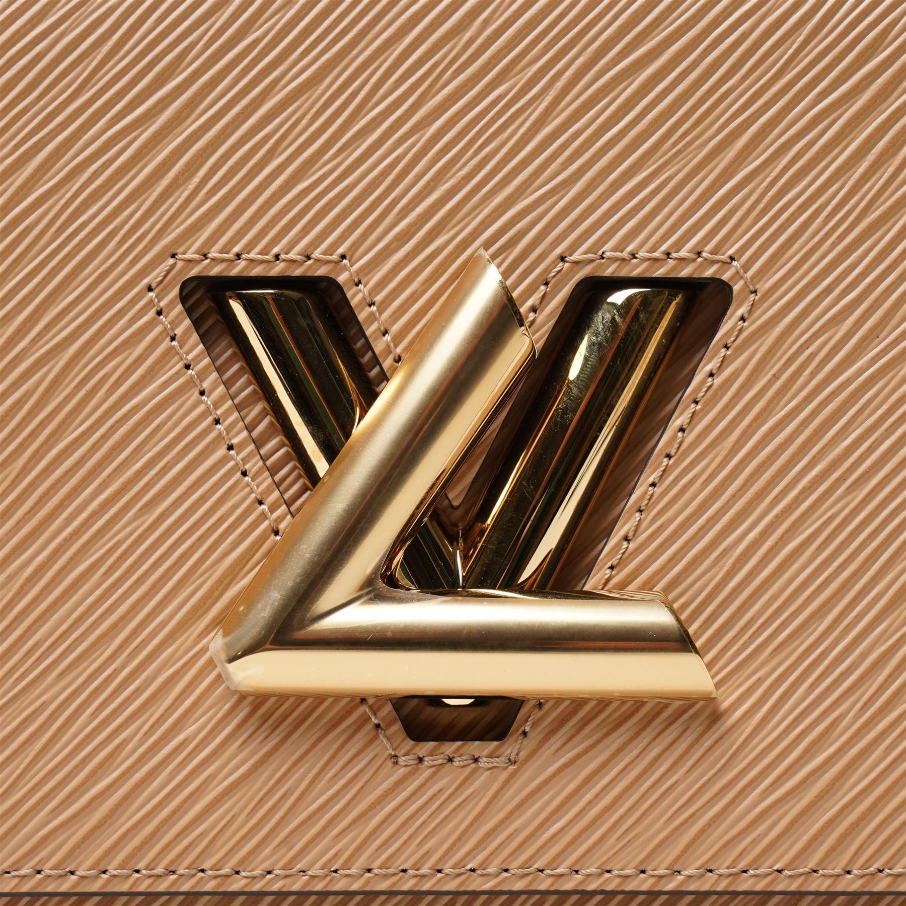 Louis Vuitton - ‘Twist’ MM Bag, the model introduced for the Cruise 2015 collection under Nicolas Ghesquière, in structured beige Epi cow hide leather with black sides, with gold-tone signature LV monogram twist-lock fastening and chain carrying handle, with detachable flat leather shoulder or crossbody strap, unused with original box and dust bag