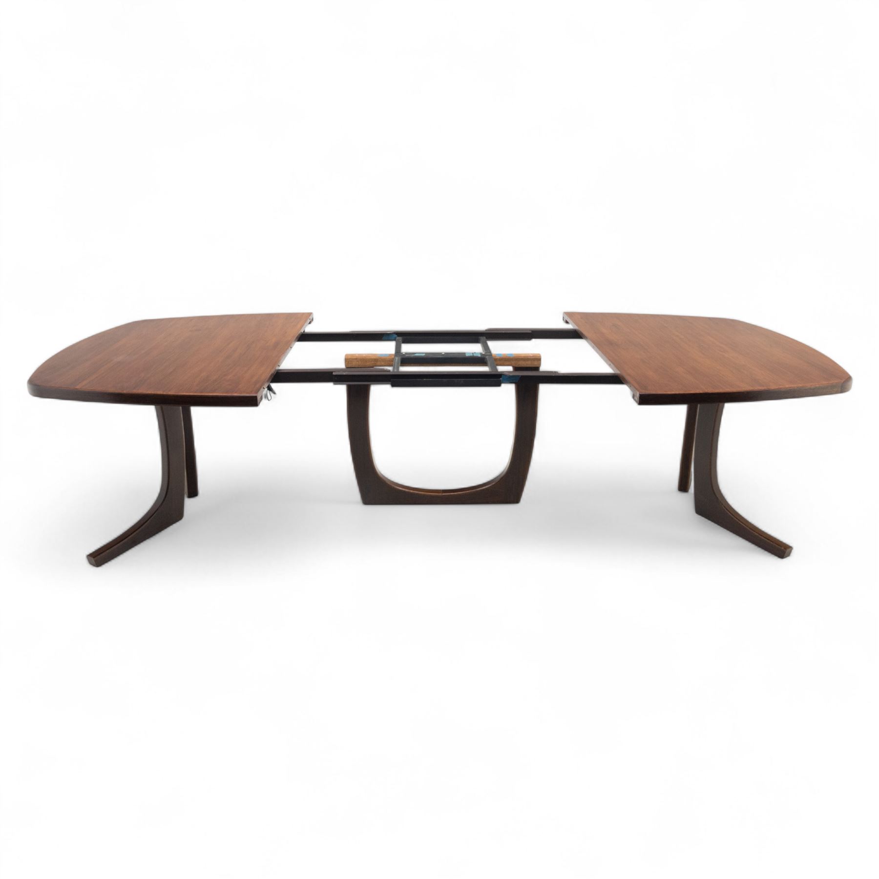 Lynggard Møbler - mid 20th century Danish teak extending dining table, the rounded rectangular veneered top with concealed central leaf, raised on twin sculpted pedestal bases, (Extends to 300cm) combining fine craftsmanship and organic form typical of Scandinavian modern design from the 1960s