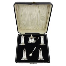 Silver five piece cruet set, patent No. 325841, with bakelite interiors by Joseph Gloster Ltd, Birmingham 1935/6, in fitted velvet lined case