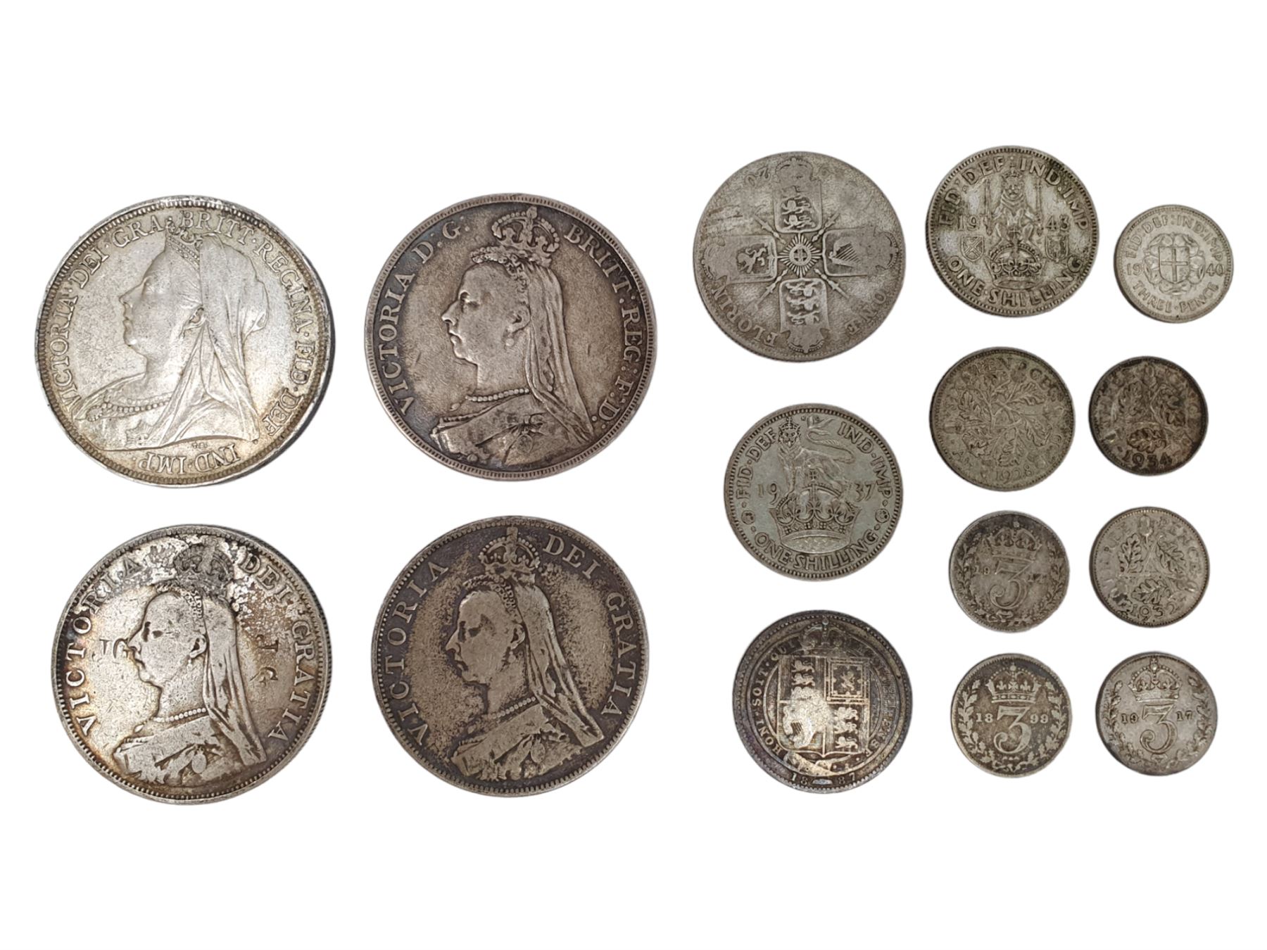 Queen Victoria 1889 and 1897 crown coins, 1888 (stamped JG to obverse) and 1890 double florins and a small number of pre 1947 Great British silver coins