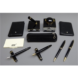  Writing Instruments - Montblanc Meisterstuck set of four two '14k' gold nib fountain pens, ballpoint pen and propelling pencil, cased, with pen stand, notebook, address book and inkwell (6)  
