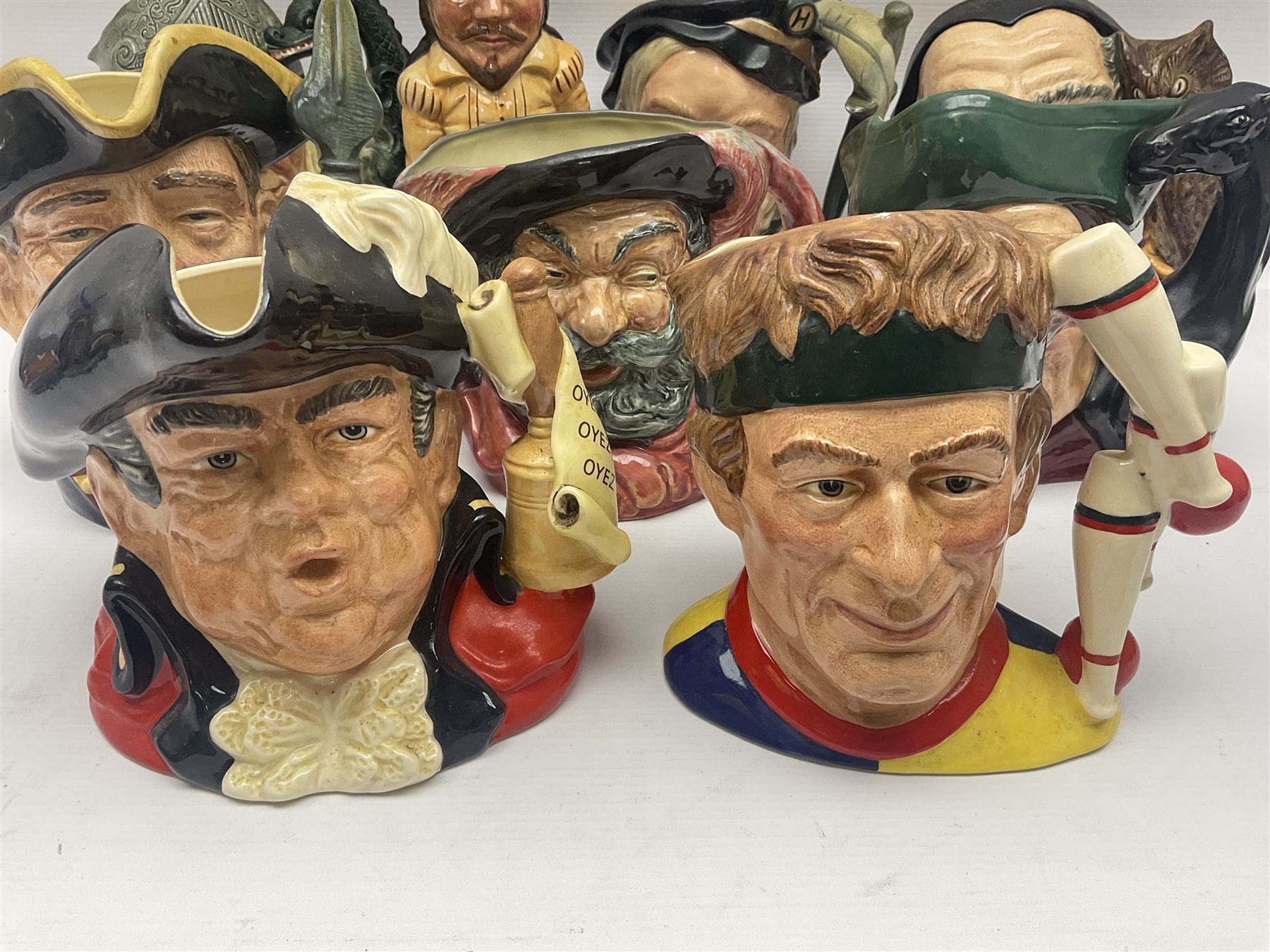 Eight Royal Doulton character jugs, including St George D6618, Guardsman D6568, The Juggler D6835 etc, together with Royal Doulton toby jug Sir Francis Drake D6660