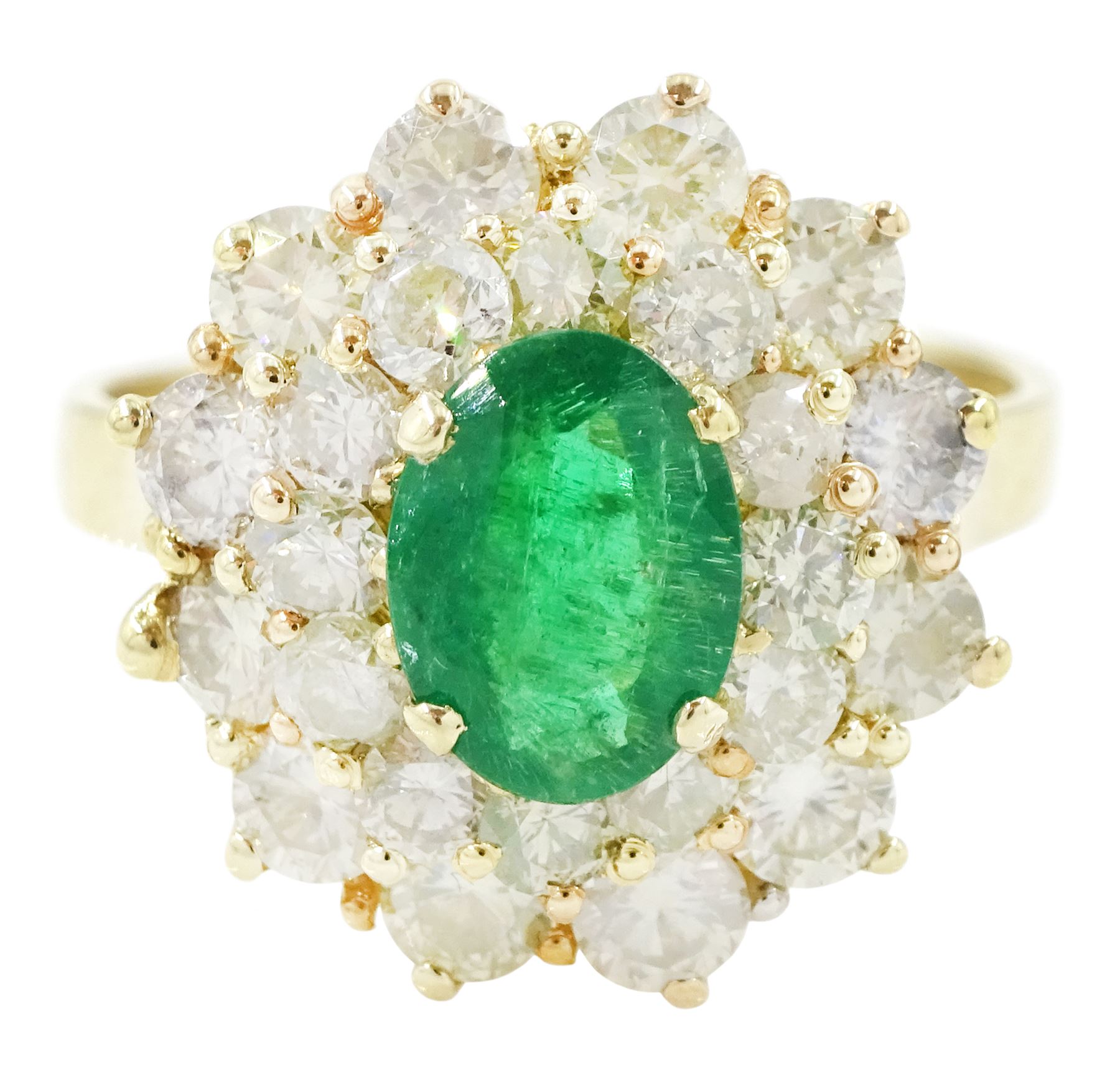 14ct gold emerald and diamond cluster ring, single oval cut emerald of approx 1.05 carat, surrounded by two rows of twenty four round brilliant cut light yellow diamonds, total diamond weight approx 2.35 carat