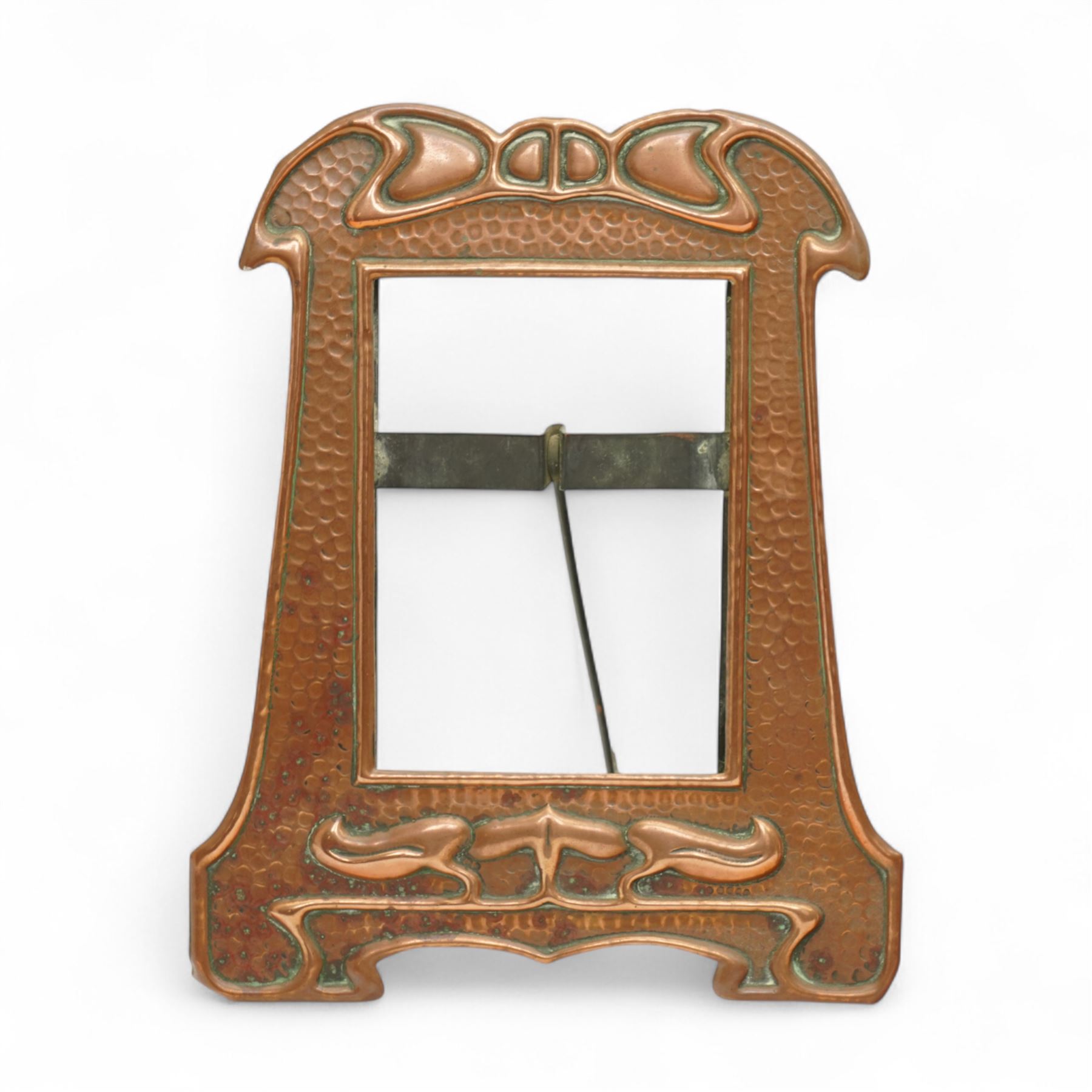 Newlyn type Arts and Crafts copper photograph frame decorated with a fish and galleon 24cm x 20cm with oval aperture and two other Newlyn style beaten copper frames (3)