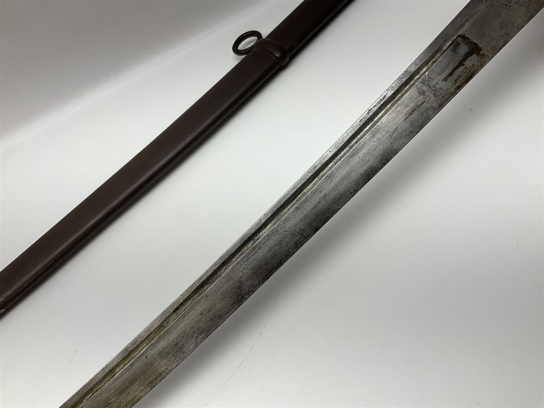 19th Century German (Saxony) Cavalry Sword, the 90.5cm single edge curved steel blade with narrow fuller to the back edge at each side, engraved with a crowned AR monogram and coat of arms, stamped with crowned AR, the back edge engraved C.v Keller im Solingen 1862, the brass half basket hilt with three flat curved bars, applied badge missing, marked G.R. 4, with ribbed leather covered grip and leather finger strap; in steel scabbard with two fixed suspension rings to one side and stamped G.R. II 118; L109.5cm overall