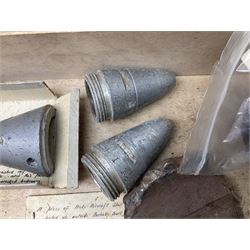 Small collection of WW2 shrapnel and German and British shell parts, most with manuscript details of where and when found including London, Leeds, Bristol, Linton-on-Ouse etc