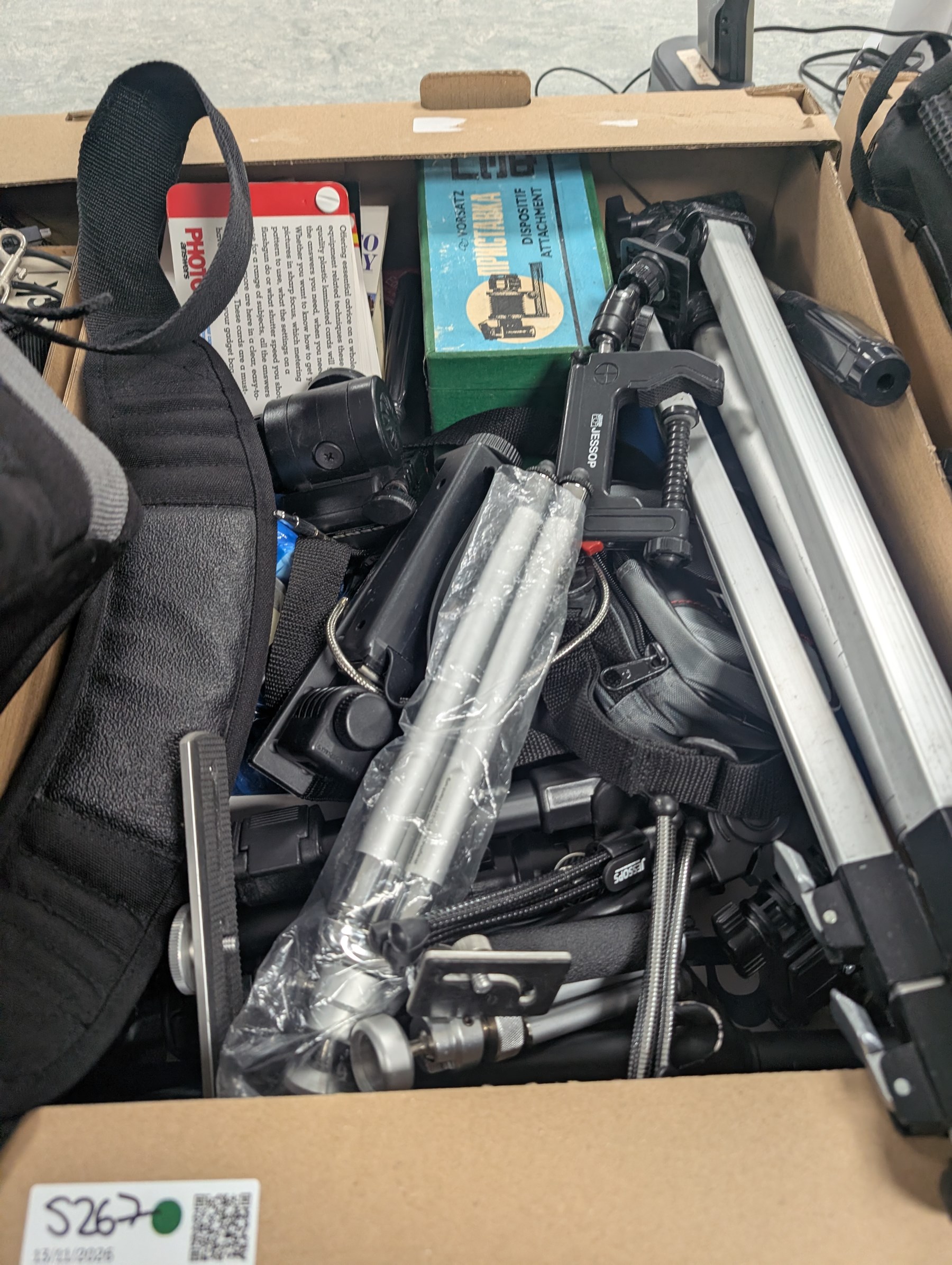 Collection of cameras and photography equipment, including Canon EOS 1000F DSLR, Fujifilm S9500, Canon EOS 10, lenses, filters, tripods, etc, in three boxes