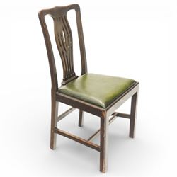 Set of eight Georgian style mahogany dining chairs, comprising six chairs and two carvers, the shaped top rails above pierced vase splats, and green leather upholstered drop in seats, upon square legs united by stretchers