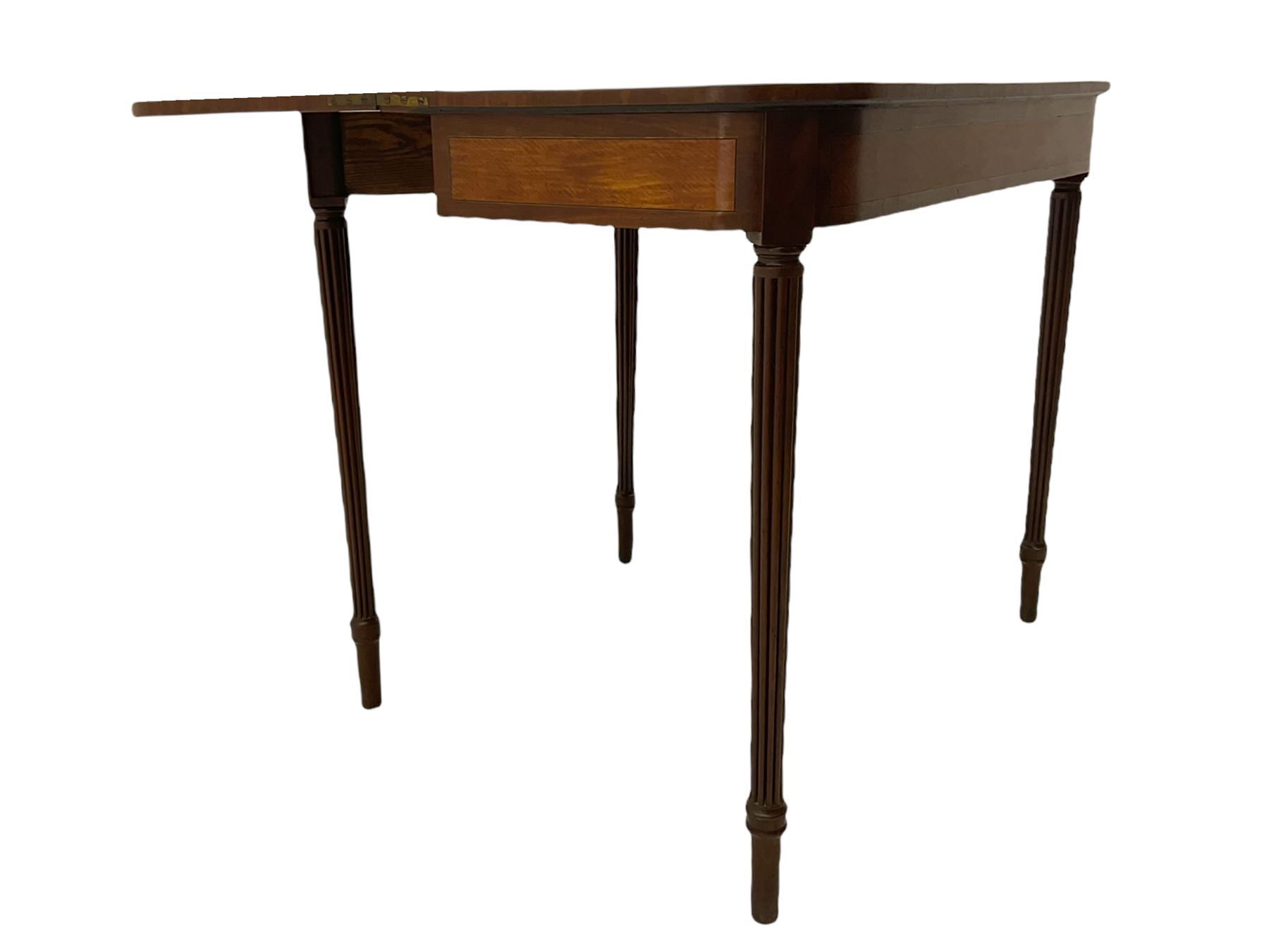 Early 19th century tea table, rectangular fold-over top with rounded corners, the frieze and sides inlaid with satinwood panels, double gate-leg action base, on reeded supports 