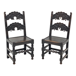 Pair late 19th century oak Yorkshire type chairs, backs relief carved with scrolls and foliage, half turned column mounts to upright supports, turned front stretchers and supports, seat height - 45cm