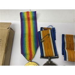 WWI pair of medals comprising British War Medal and Victory Medal awarded to 32682 Pte. W. Meadows W. Rid. R. in issue box; WWI pair of medals comprising 1914-15 Star and Victory Medal awarded to 3720 Pte. (later Cpl.) E. Petty W. York. R. with issue letter from Tank Corps; WWII group of five medals comprising 1939-45 War Medal, Defence Medal and 1939-45, Italy and Africa Stars; all with ribbons; and book of nineteen seaman's Certificates of Discharge to cook Charles Filburn 1893 - 1901 from various British ports