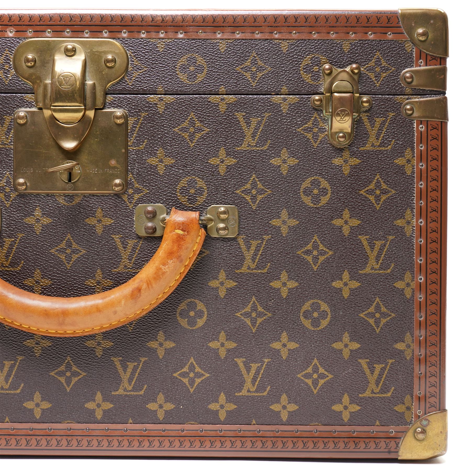 Mid-20th century Louis Vuitton monogram cabin trunk,  monogram canvas with lozine trim and brass mounts, single front leather handle with lock stamped Louis Vuitton with matching key code 1080701, the interior fitted with original webbing straps and lift-out tray, circa1960s, with original key present
