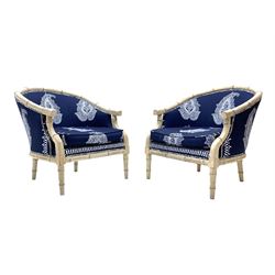 Pair contemporary tub shaped armchairs with faux bamboo wooden frames, distressed white paint finish, upholstered in blue and white paisley patterned fabric