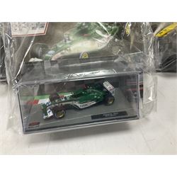 Panini Formula 1 The Car Collection - twelve die-cast models including ten in unopened packaging with periodical; all models in plastic display boxes; and eight other boxed die-cast models of racing cars by Corgi, Onyx, Classico, Minichamps etc (20)