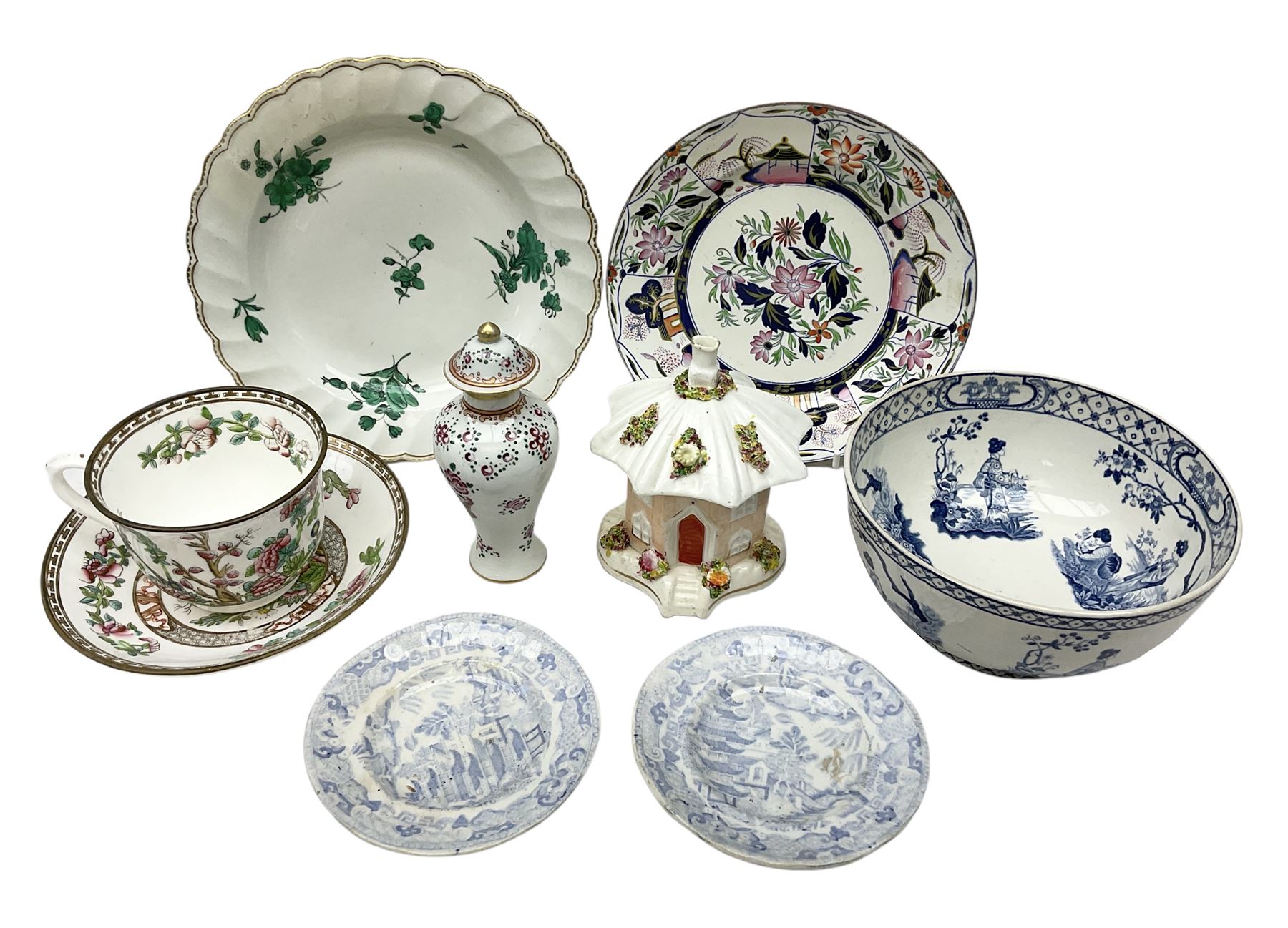 Mid 18th century Chelsea plate with gold anchor mark beneath, decorated with green floral sprays upon plain ground, the moulded cavetto shaped border with gilt rim, (A/F), D22cm, together with early 20th century Adams Tunstall Tokio pearlware slop bowl, Spode plate decorated in the Imari type pallette, with impressed and printed marks beneath, 19th century Indian Tree pattern breakfast cup and saucer, small polychrome enamelled vase and cover in the style of Samson of Paris, with marks beneath, and a pastille burner