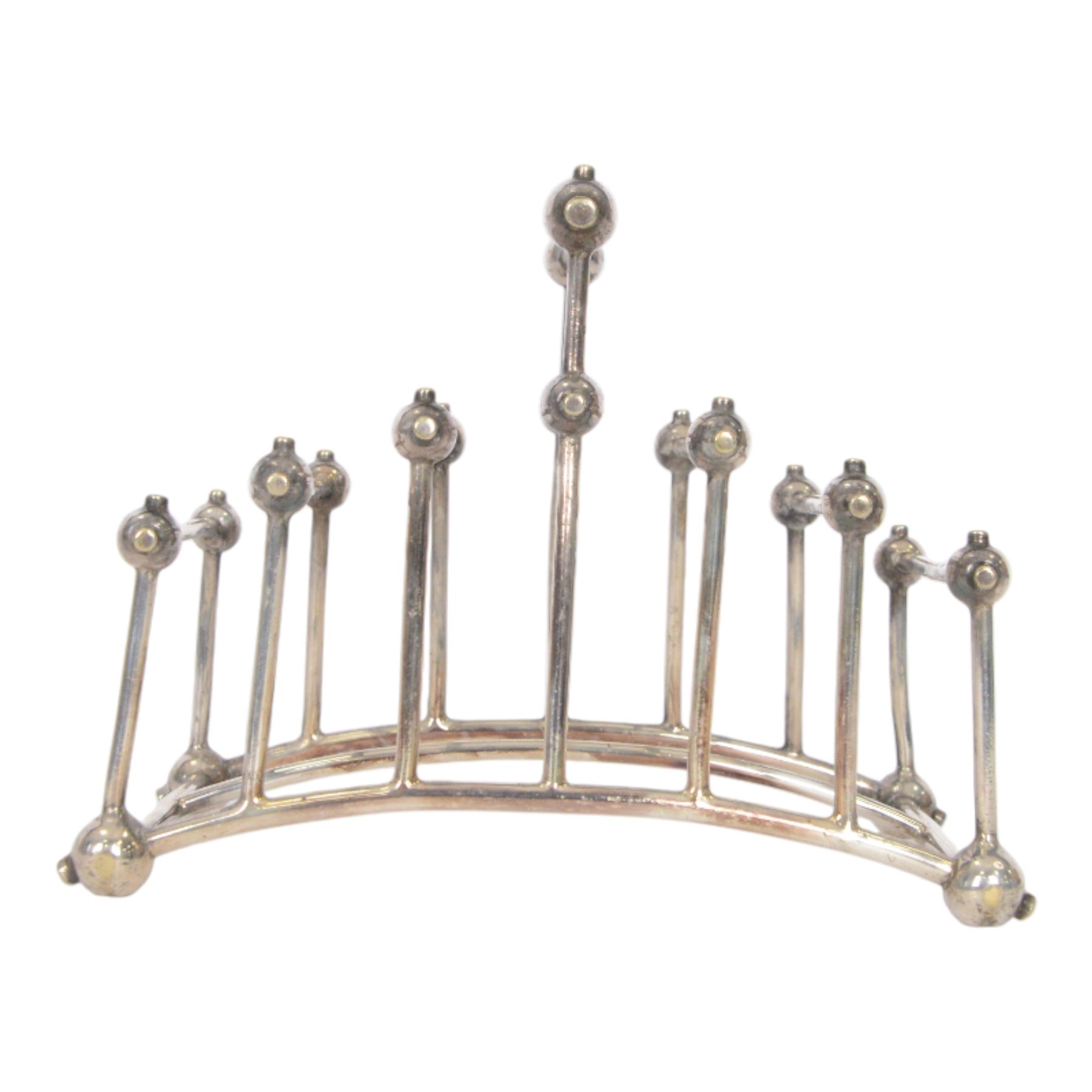 Christopher Dresser (1834-1904) for Hukin & Heath, silver plated six division bridge toast rack, circa 1880, Stamped makers marks and model number 2554, H12cm