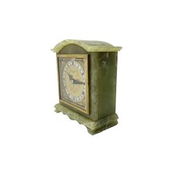 Elliot - English 20th century timepiece mantle clock in a green Onyx case, brass dial with spandrels, pierced steel hands, engraved centre and silvered chapter ring, retailed by Owen  & Robinson Leeds, integral key, wound and set from the rear.