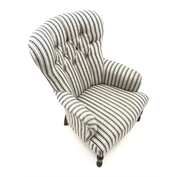  Small Victorian style armchair upholstered in deep buttoned stripe fabric, turned supports, W64cm  