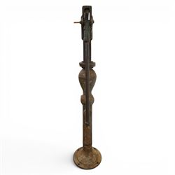 Early 20th century cast iron floor standing water pump, cylindrical column with bulbous chamber, side spout with star-shaped tap, lever action mechanism with ratchet adjustment, flanged circular base, H 127cm
