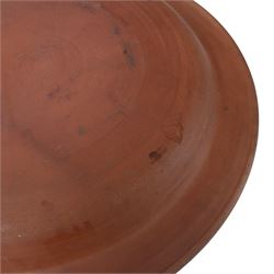 Wetheriggs Pottery of Penrith slipware Ivanhoe charger, the centre depicting a pair of jousting knights, with the King and Queen looking on, with impressed marks beneath, D51cm 