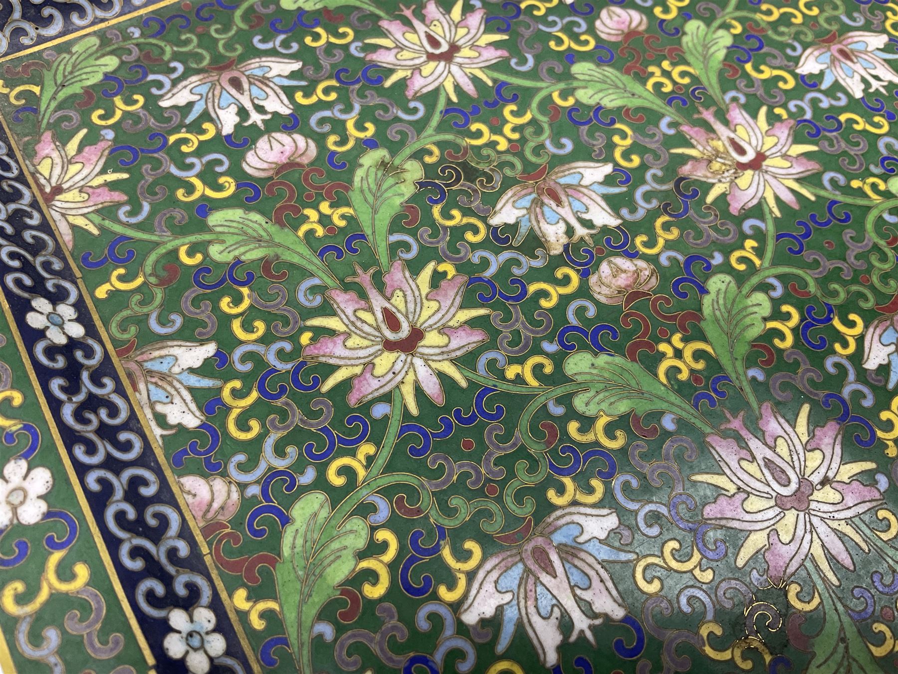 20th century Chinese cloisonne enamel smoking set, comprising two ashtrays, box and tray, with floral and foliate scrolling on green ground