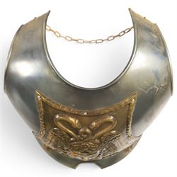 Two reproduction breast plates, including on example with Medusa to the front, H42cm