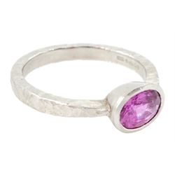 Platinum pink sapphire ring, single bezel set sapphire of approx 1.40 carat, to a planished shank, London 2019